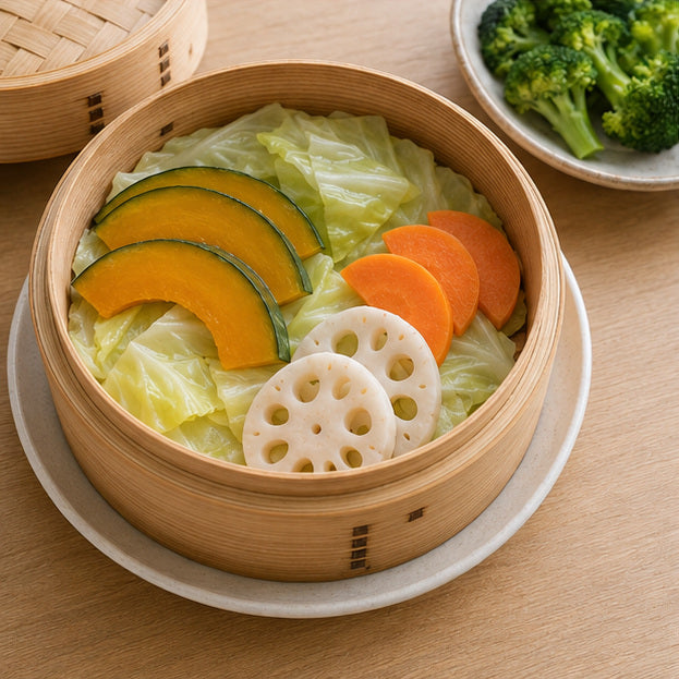 せいろにキャベツを敷き、根菜を並べた状態